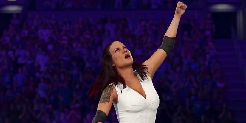 Lita posing in the game