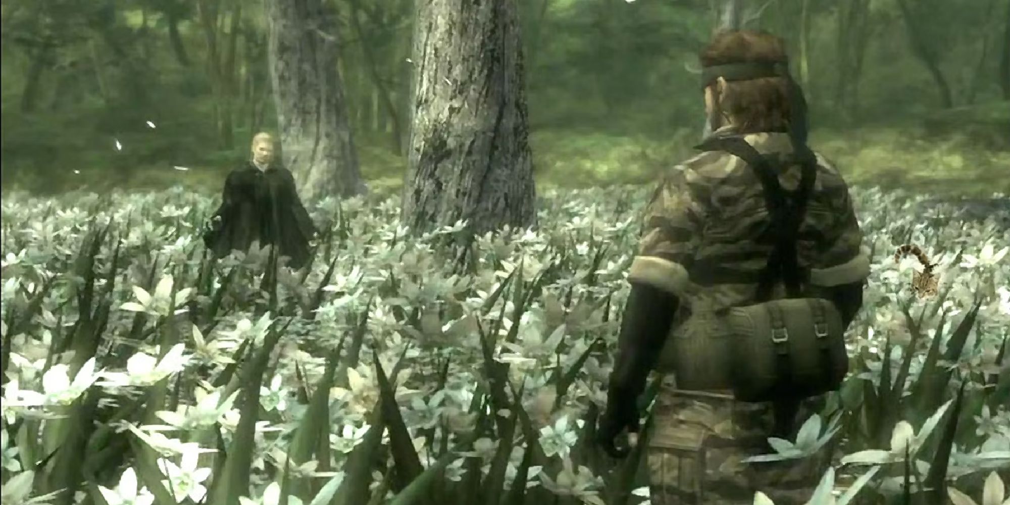 Snake and Boss facing each other in a field of white flowers.