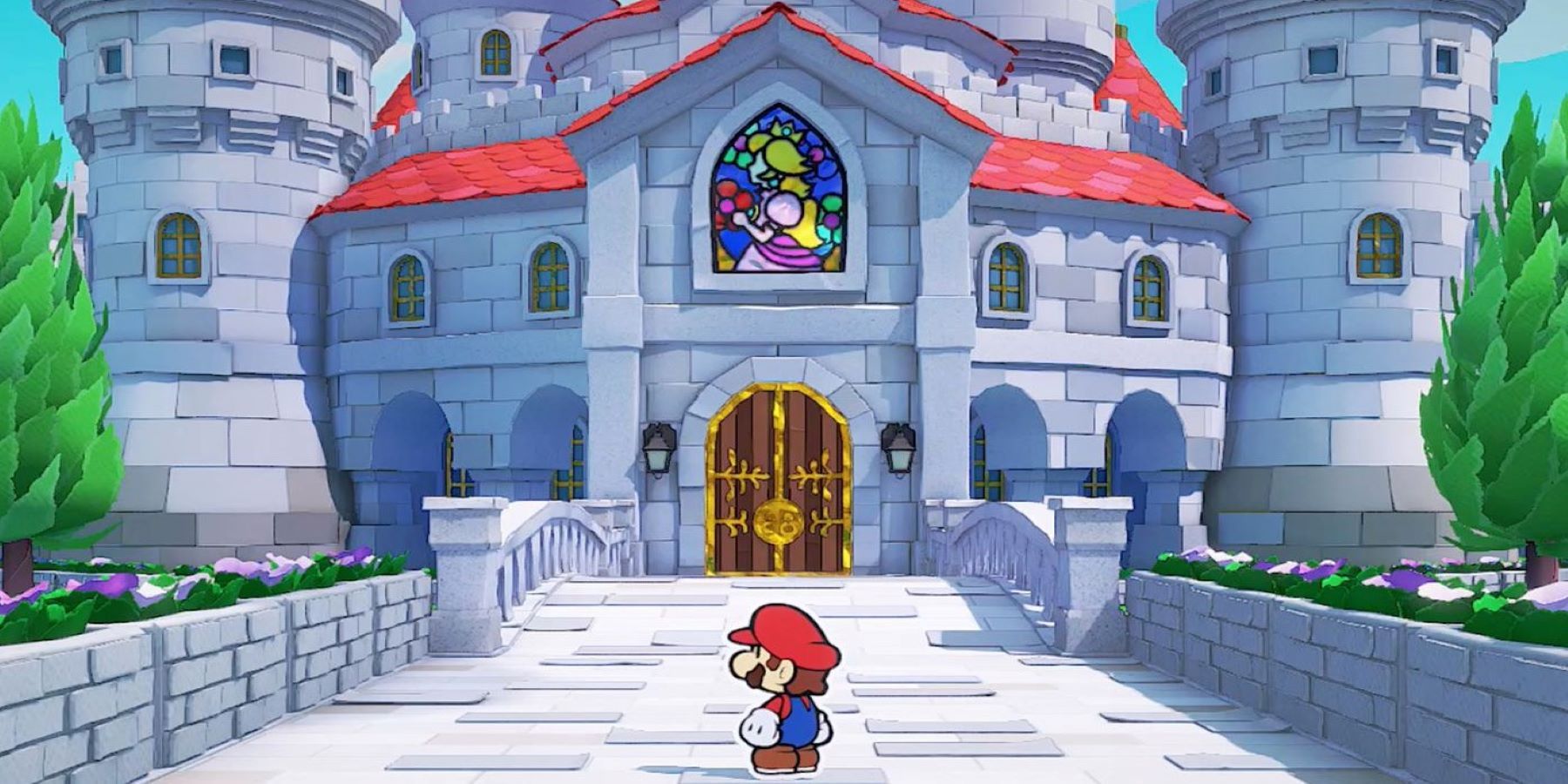 Mario standing outside Peach's Castle in Paper Mario: The Origami King