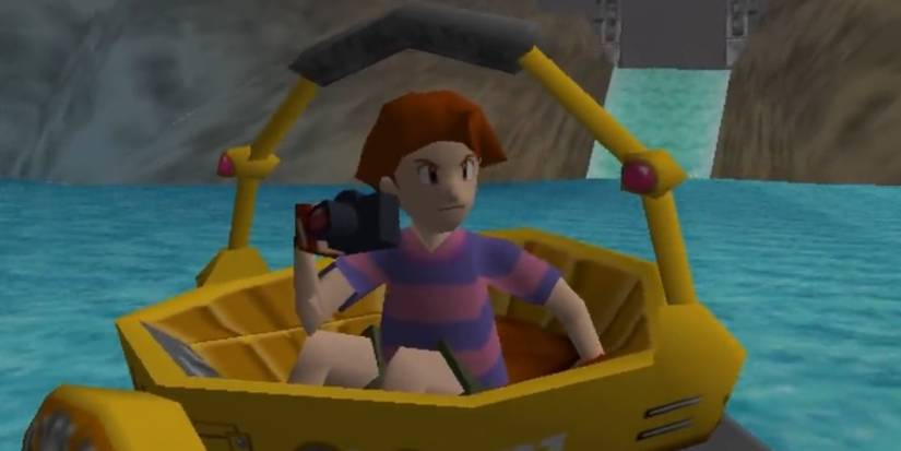Todd Snap in his vehicle taking photos in Pokemon Snap