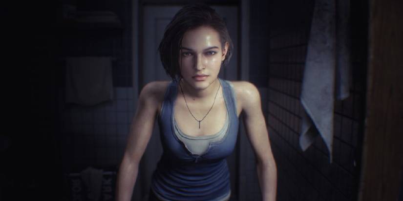 A waist-up shot of Jill checking her reflection in a bathroom mirror. 