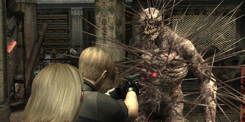 Leon aiming his gun as a regenator grows spikes to ward off close enemies. 