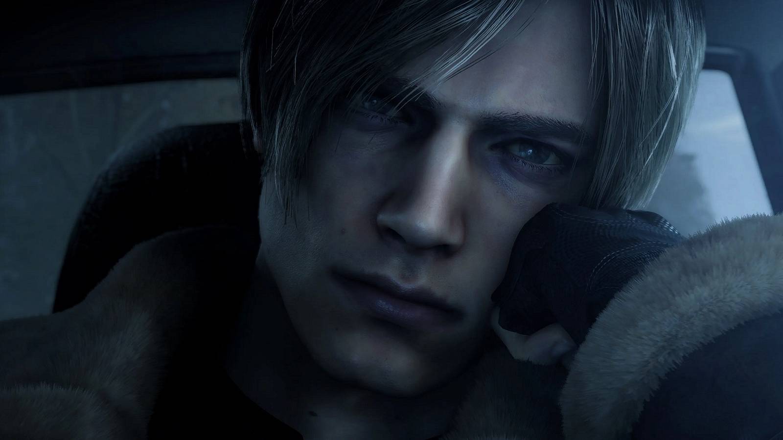 Screenshot from the Resident Evil 4 remake showing a close-up of a borrding Leon Kennedy.