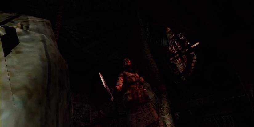 Cheryl on the floor, looking up at her bloody and armed alter ego.