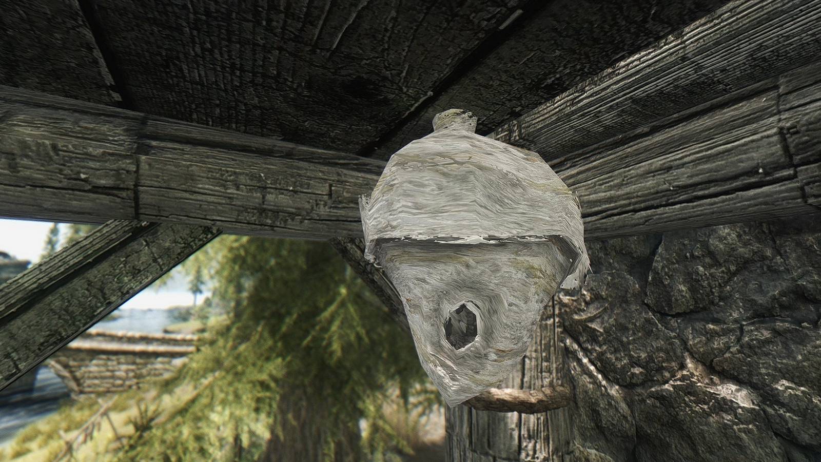 Image from Skyrim showing a mid shot of a beehive.