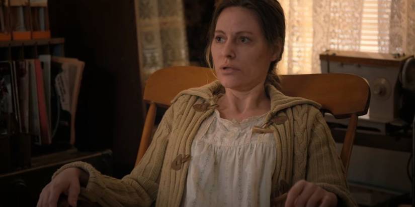 Terry Ives sitting in a chair on Stranger Things