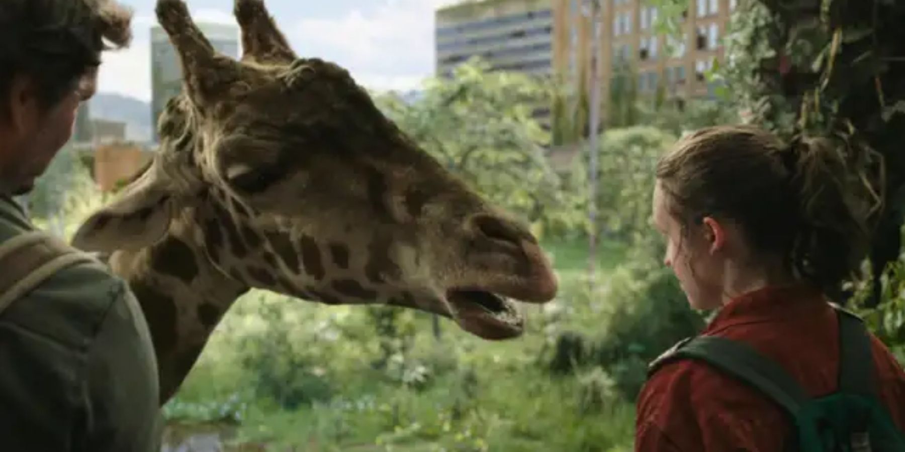 Joel and Ellie looking at a giraffe in The Last Of Us