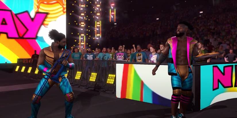 The New Day's Xavier Woods with a trombone and Kofi Kingston with a plate of pancakes walking to the ring in WWE2K23