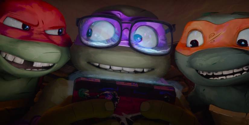 Raphael, Donatello and Michelangelo smiling in Teenage Mutant Ninja Turtles: Mutant Mayhem