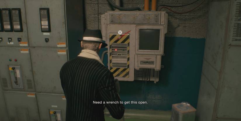 Leon prepares to upgrade his Key Card in Resident Evil 4 Remake