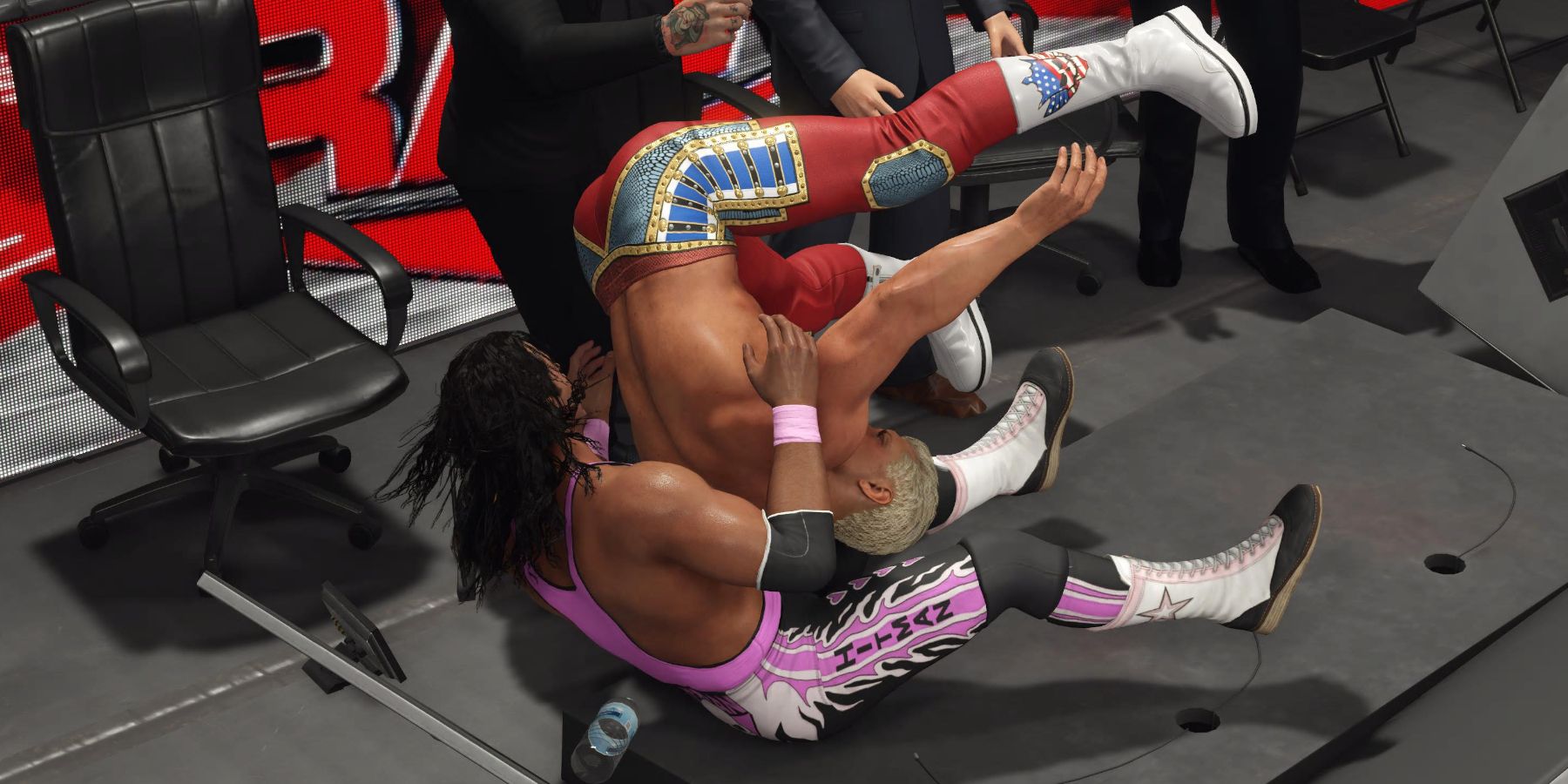 WWE 2K23 Bret Hart hitting Cody with the Finisher through the annoucner's table