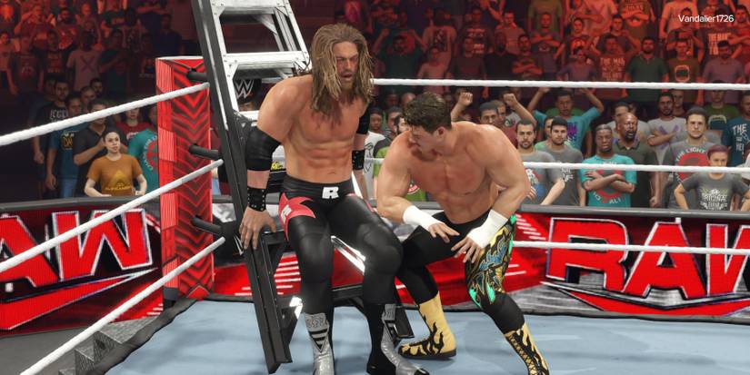 WWE 2K23 Eddie chops Edge on the ladder