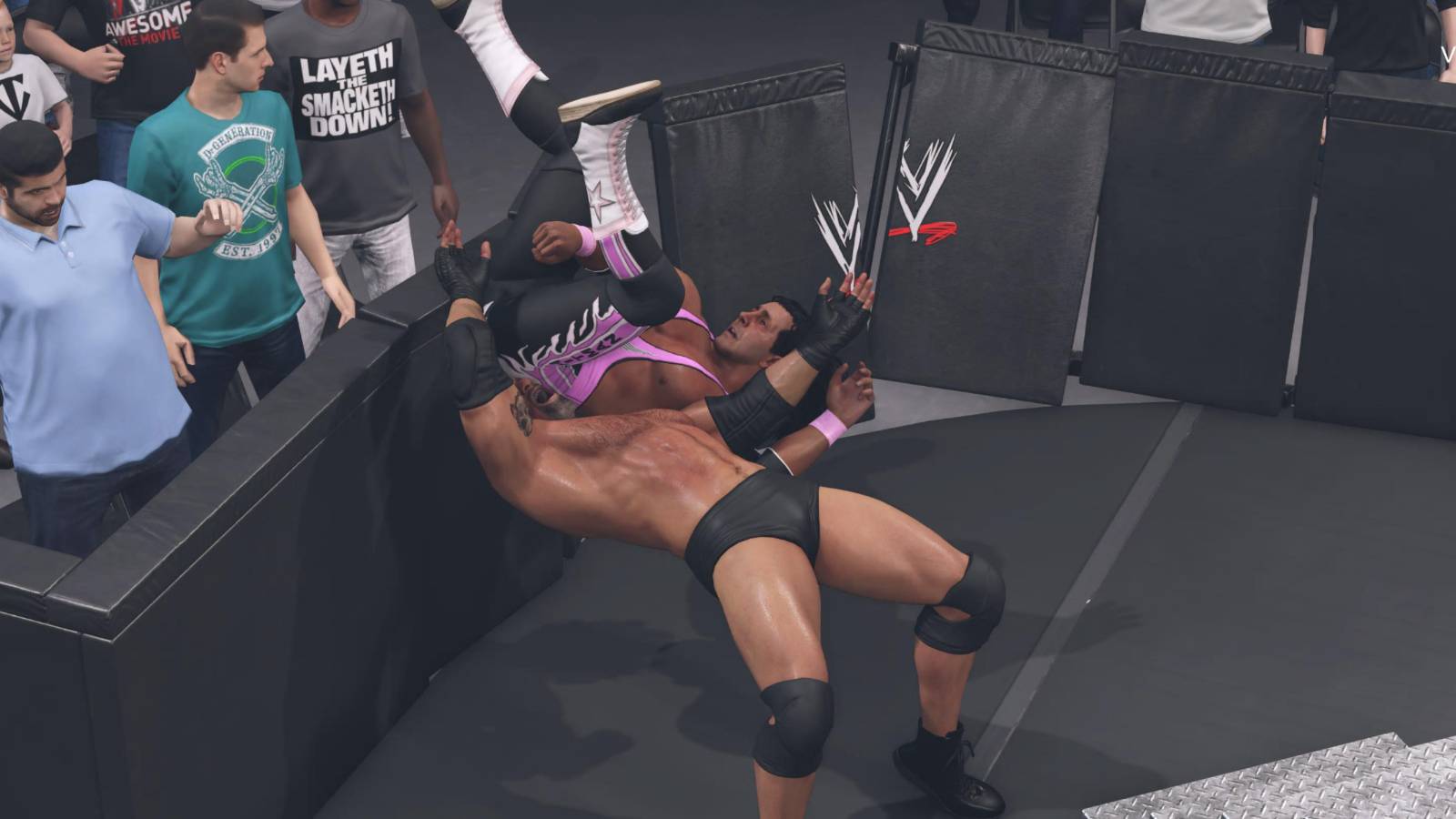 WWE 2k23 Goldberg slamming Bret Hart through the barricade