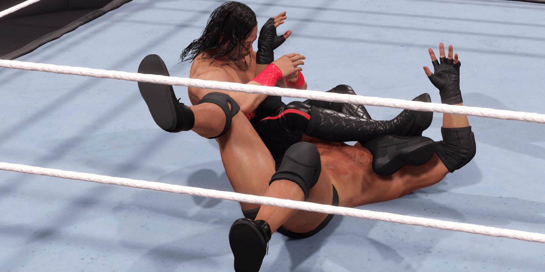 WWE 2K23 Nakamura with the armbar on Goldberg