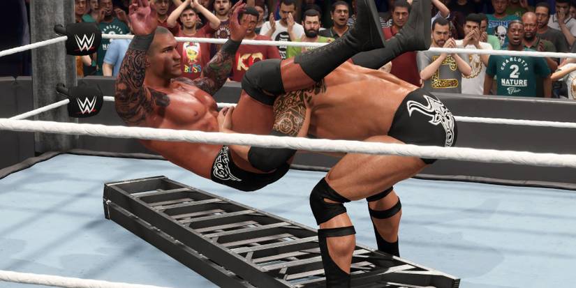 WWE 2K23 Rock powerbombs Orton on to the ladder