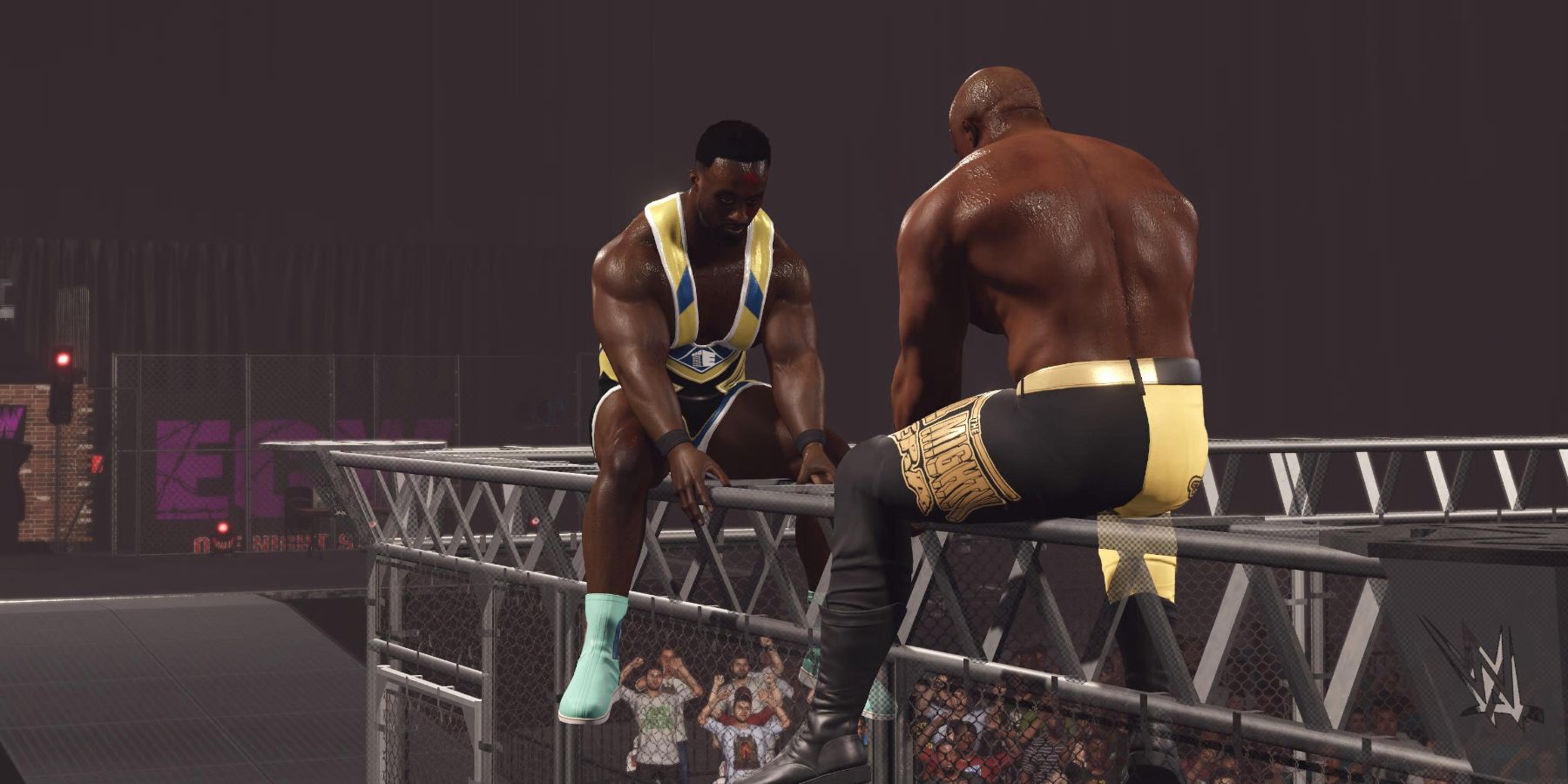 WWE2K23 Bobby Lashley and Big E at the top of the cage