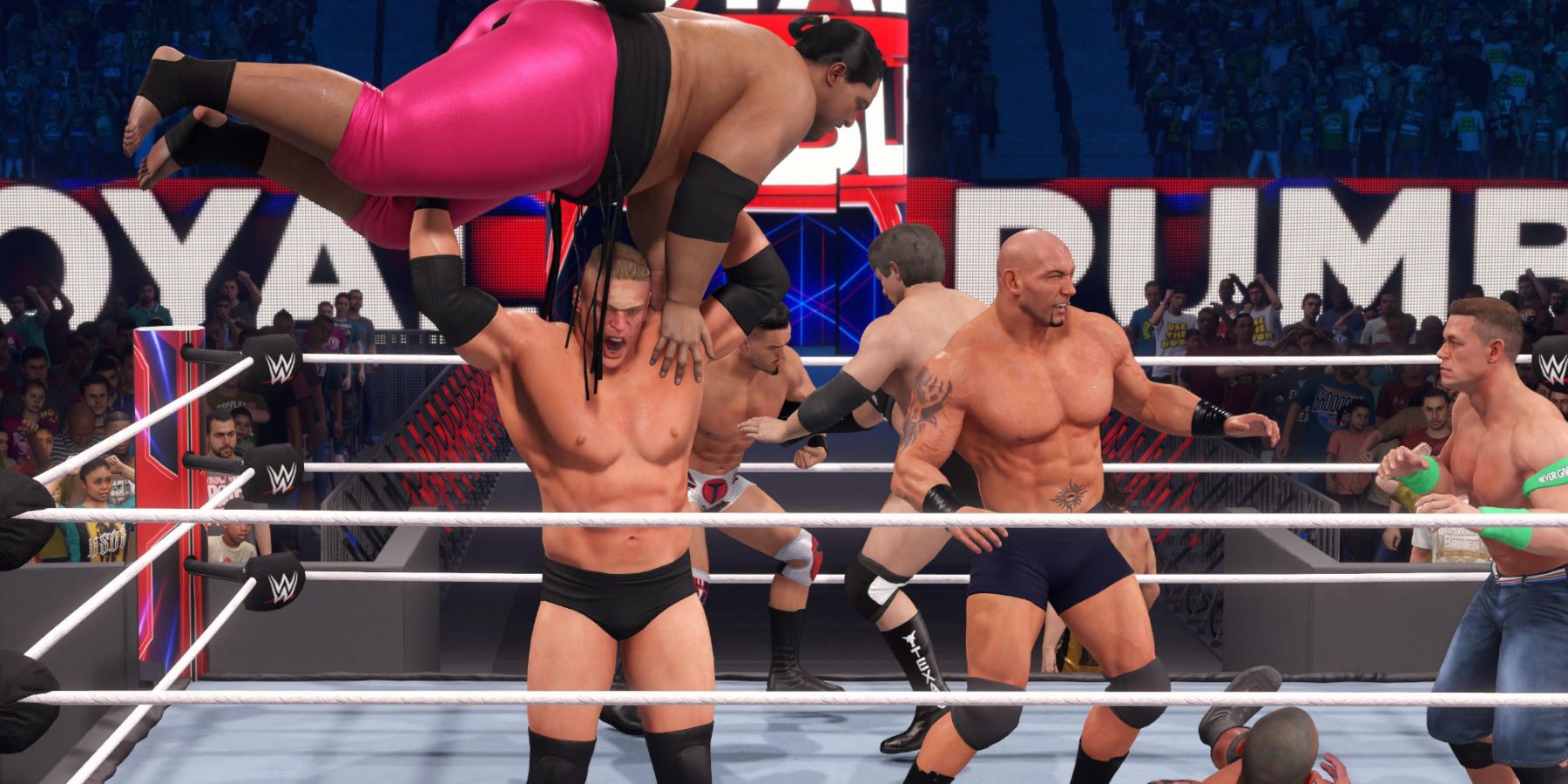 WWE2K23 Brock pressing Yokozuna over the top rope