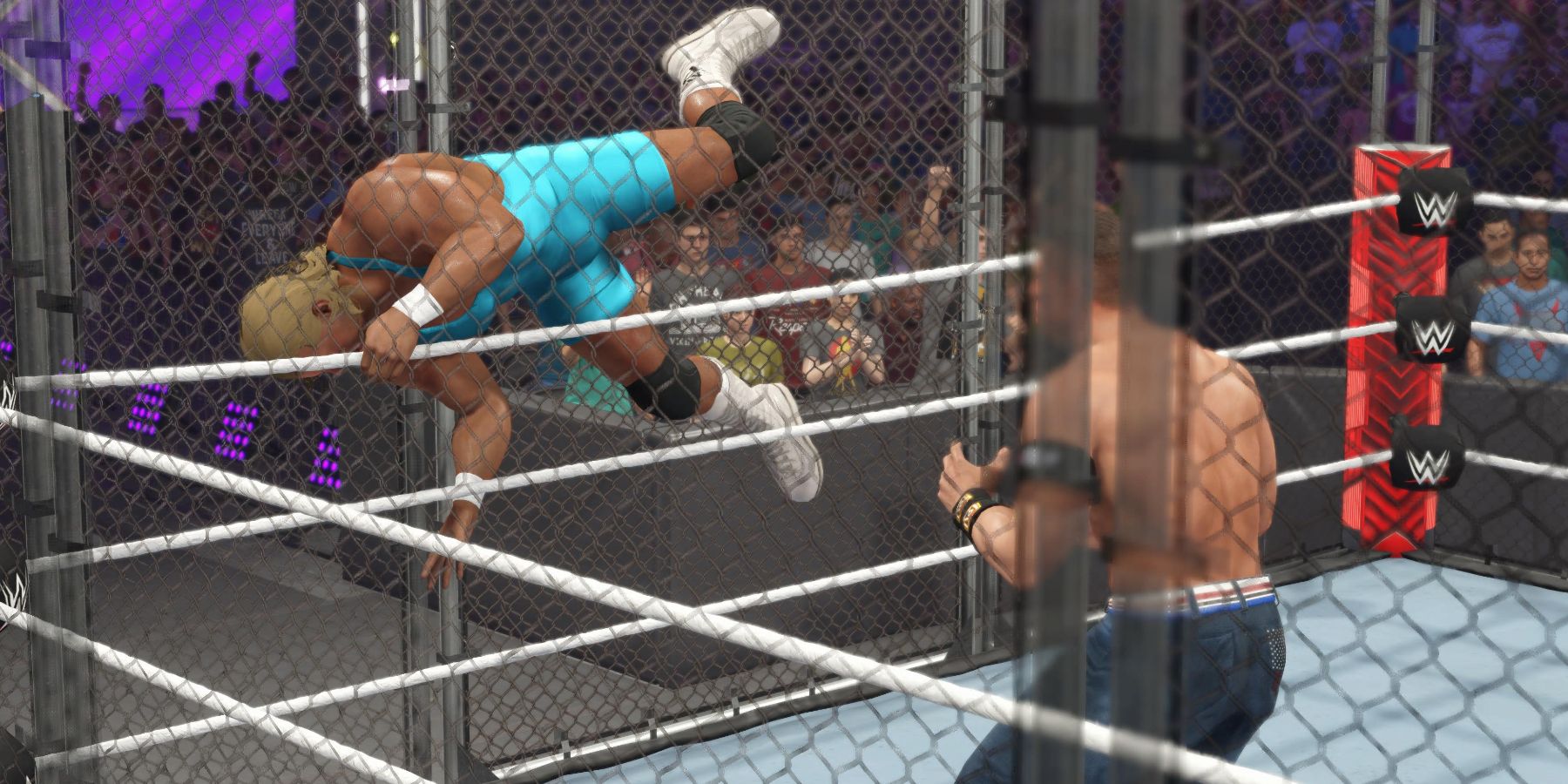 WWE2K23 Cena's whips Perfect into the cage