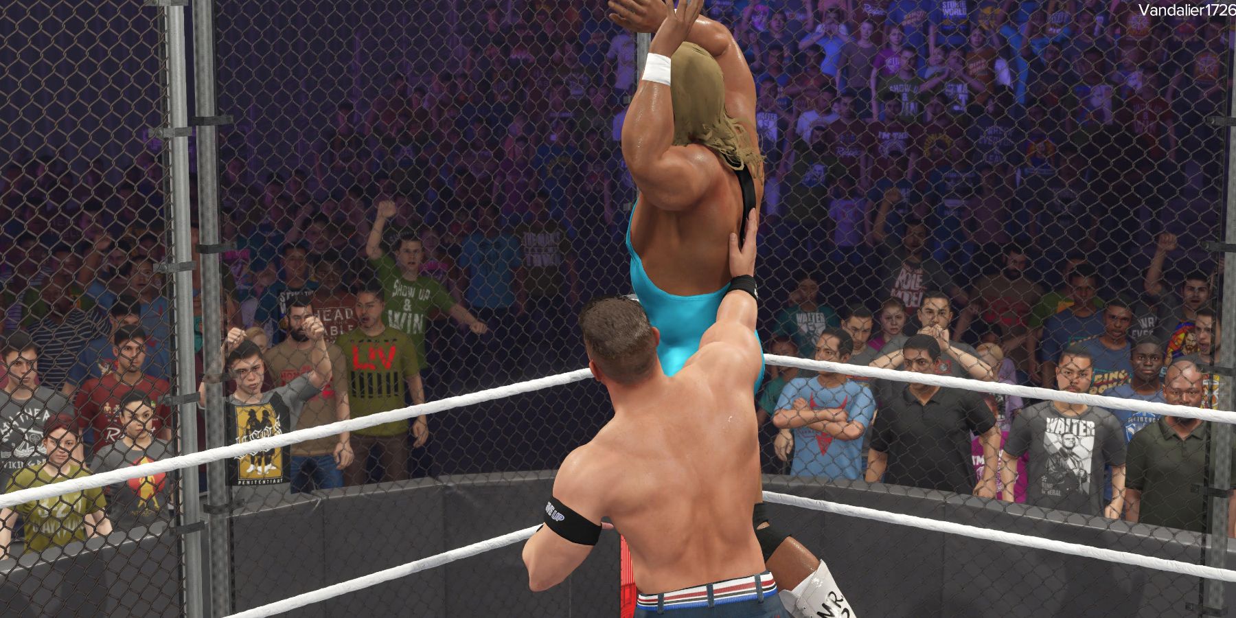 WWE2K23 Cena slamming Perfect into the cage