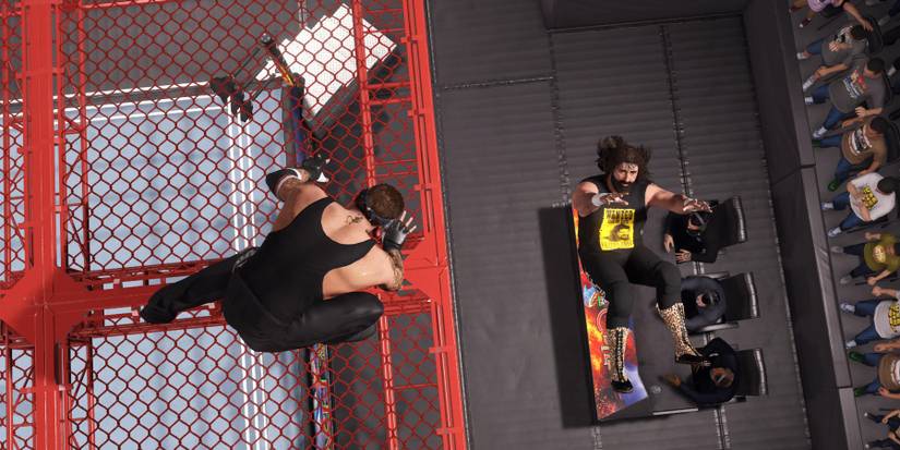 WWE2K23 Undertaker. choke slamming Cactus through announcer's table