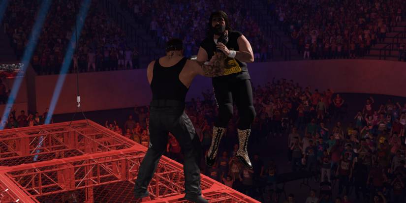 WWE2K23 Undertaker. chokeslams Cactus from the top of the cell