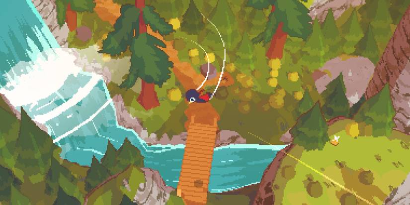 Claire flying above a bridge near a waterfall in A Short Hike