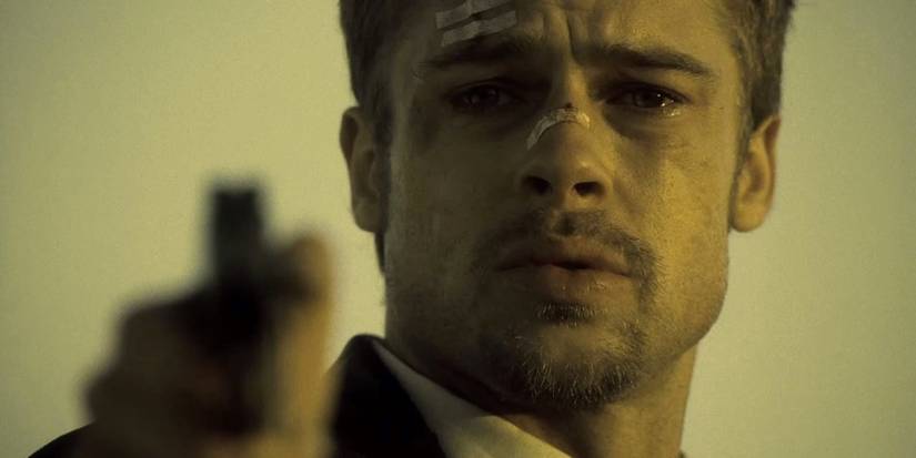 Brad_Pitt_with_a_gun_in_Seven