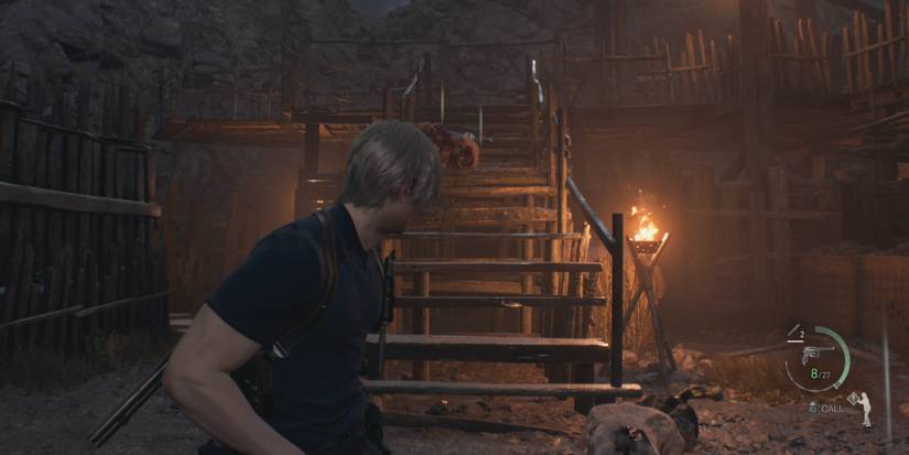 Leon faces the stairs in the Checkpoint in Resident Evil 4 remake
