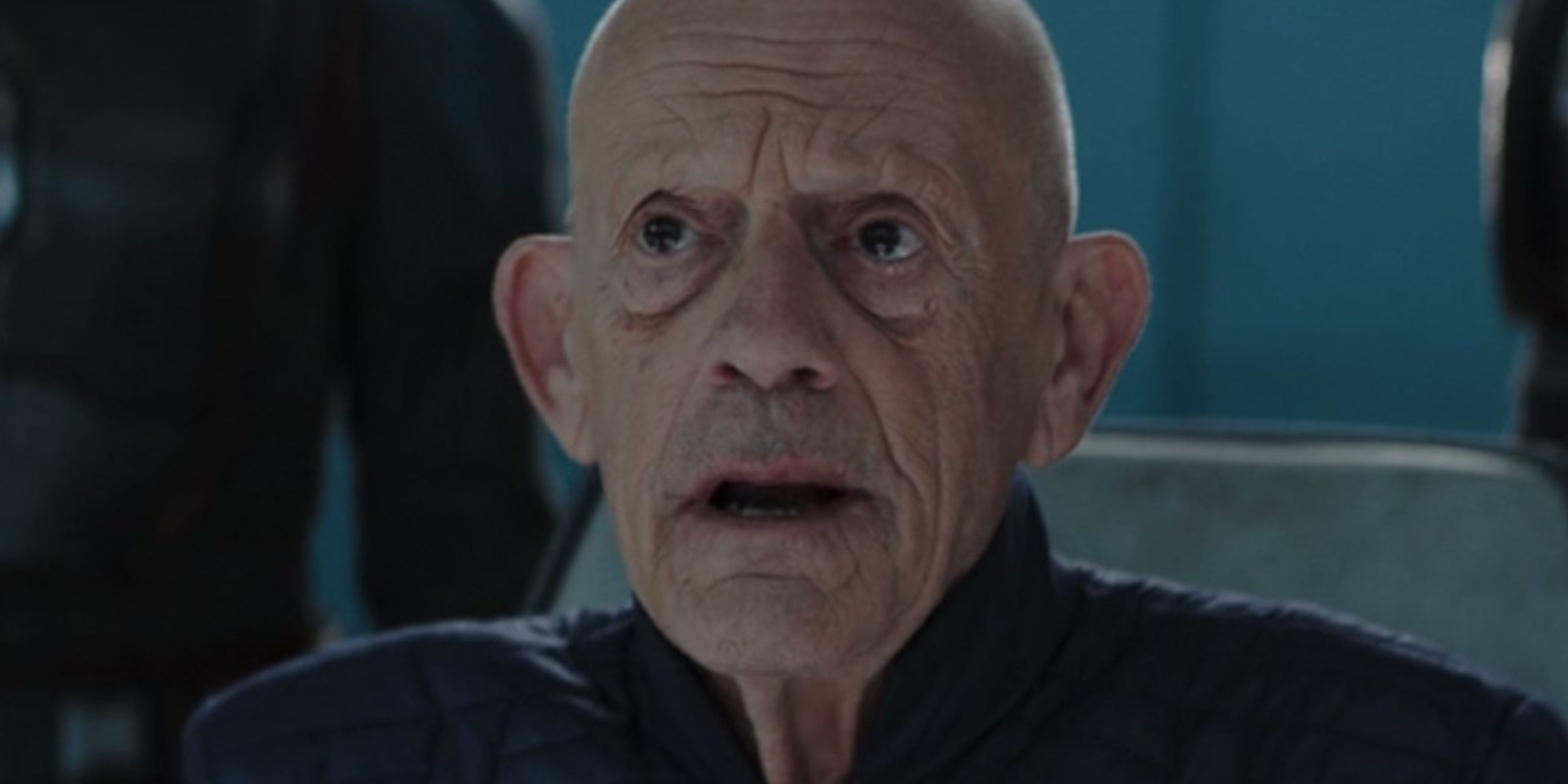 commissioner helgait played by christopher lloyd