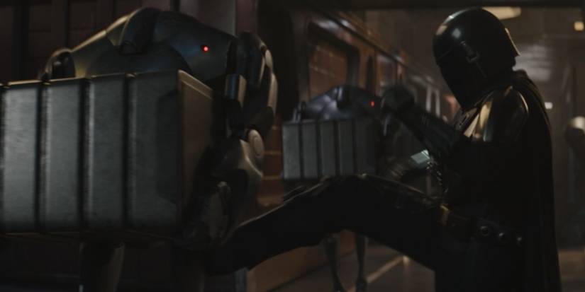din djarin kicking a battle droid