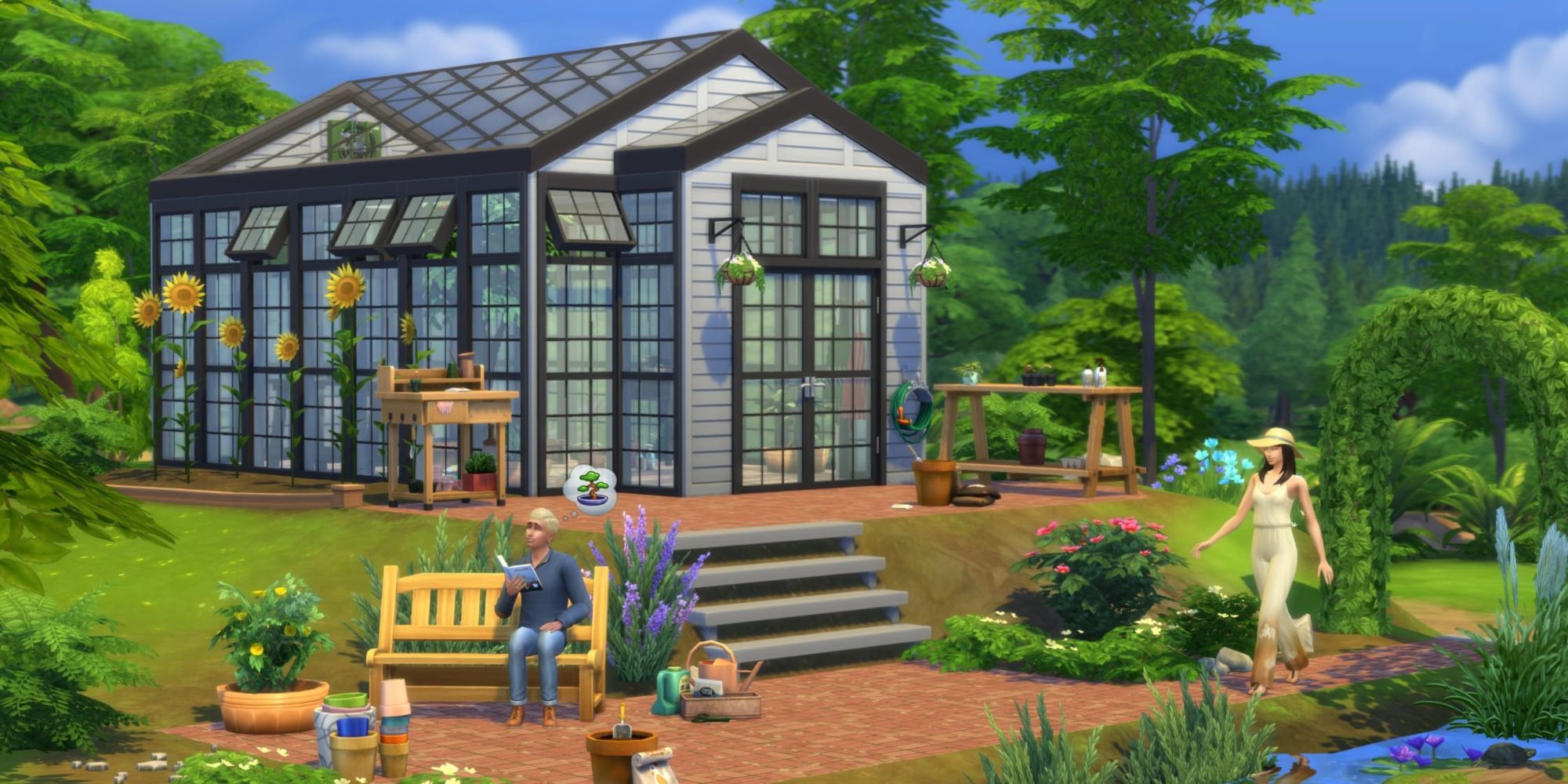 couple outside of built greenhouse using greenhouse haven kit items