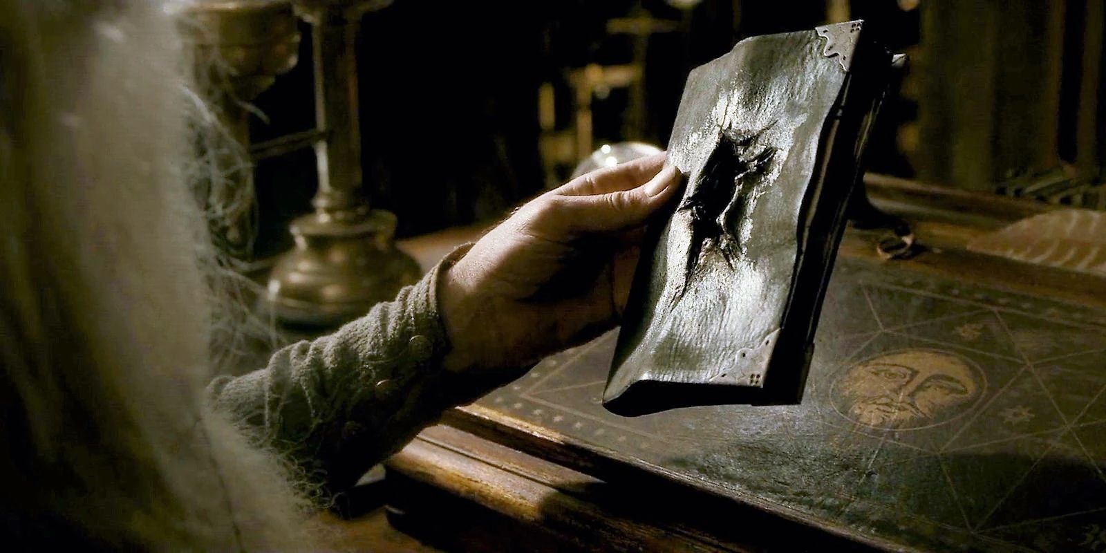 dumbledore holding tom riddle's diary