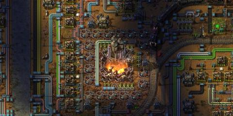 A rocket being launched from a factory in Factorio