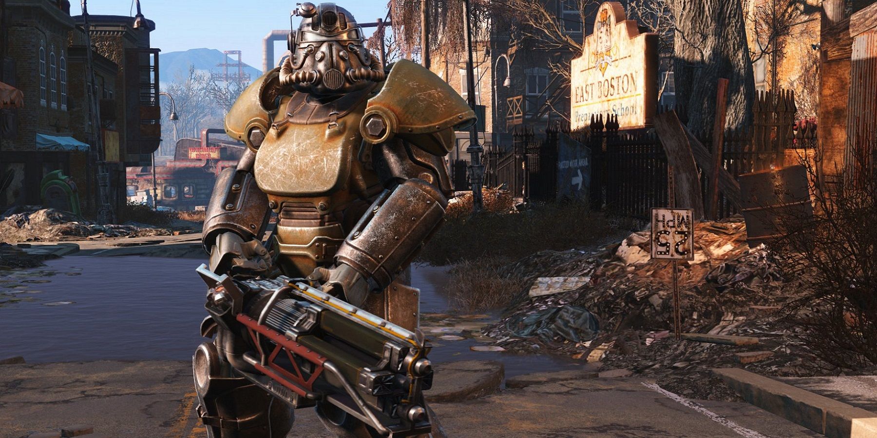 Image from Fallout 4 showing a member of the Brotherhood of Steel holding a Gatling Laser.