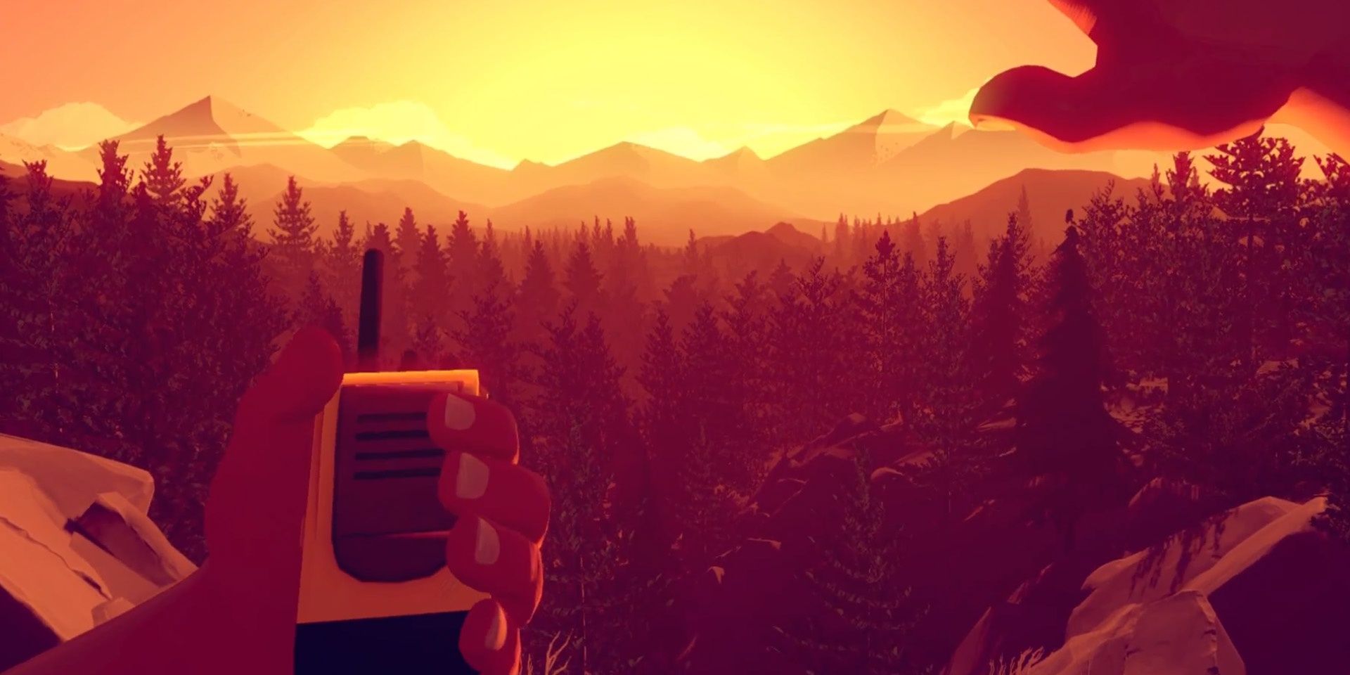 A player holding a radio looking at the forest in Firewatch