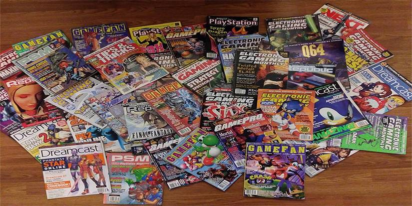 a pile of gaming magazines on the floor