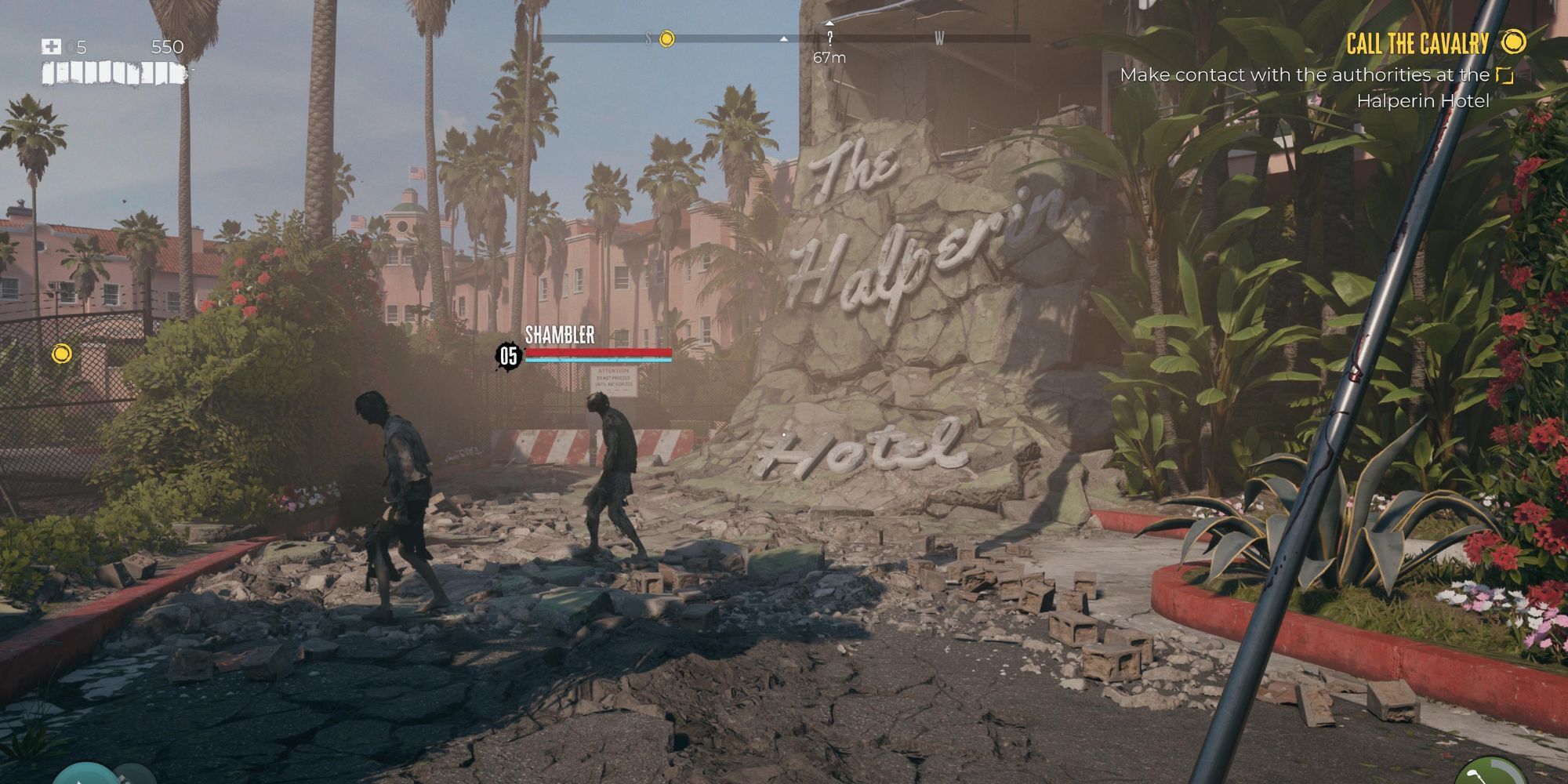 The broken Halperin Hotel sign that has slid off a building in Dead Island 2, two zombies stand in front of it 