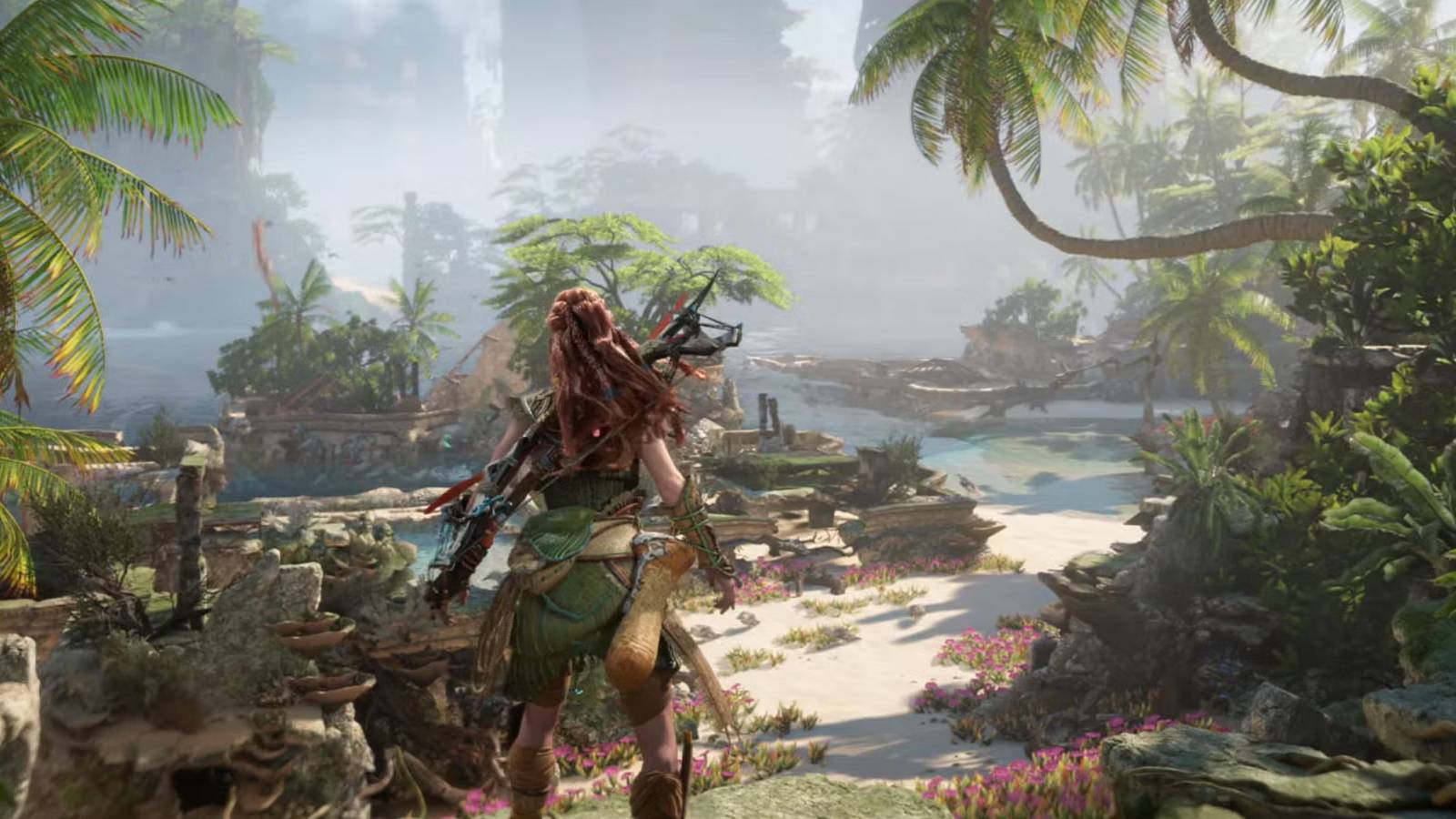 Aloy facing a beach in Horizon Forbidden West