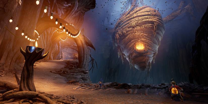 May and Cody staring at a giant bee hive in a tree in It Takes Two