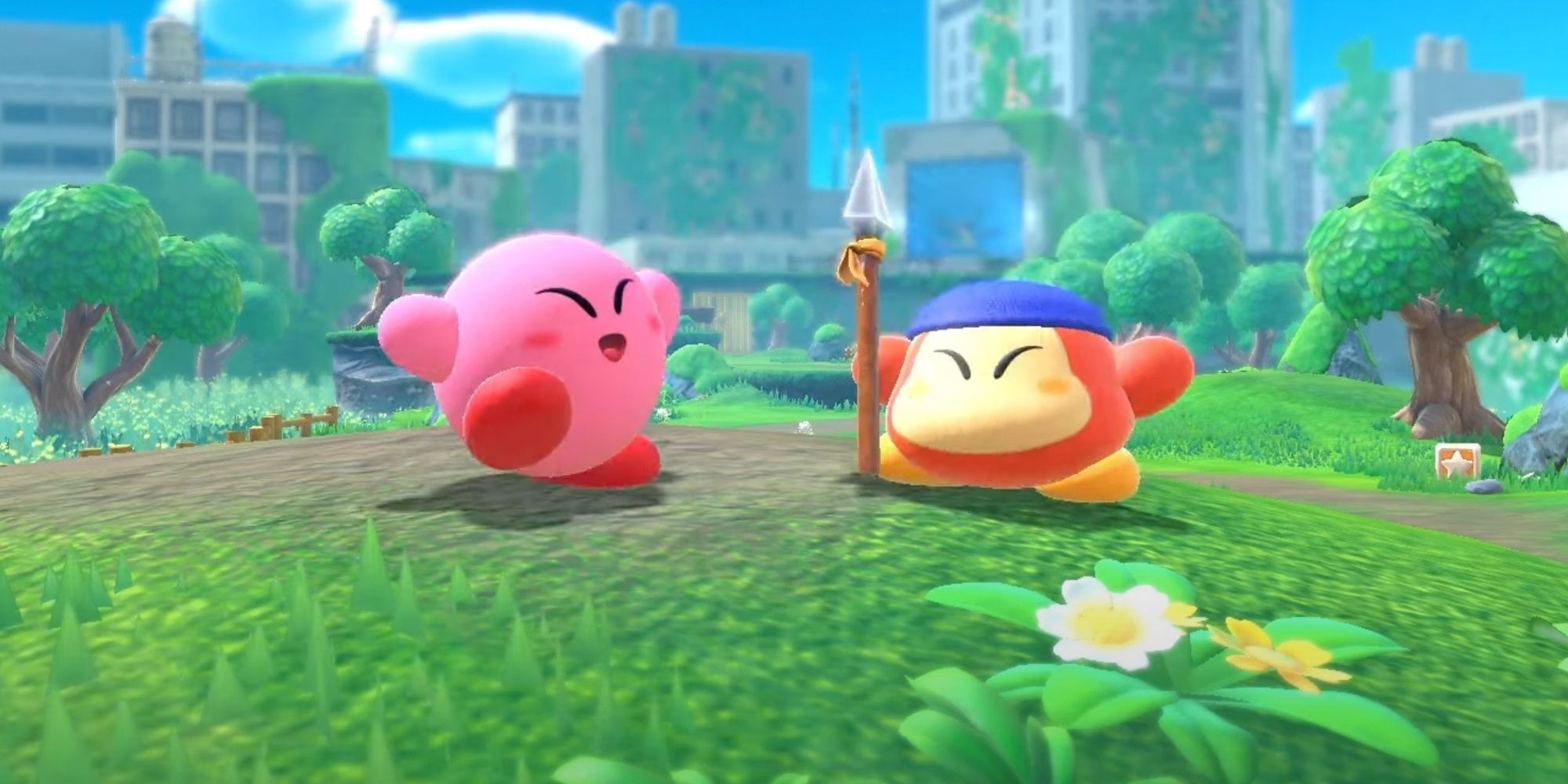Kirby and Bandana Waddle Dee celebrating together in the early stages of Kirby and the Forgotten Land