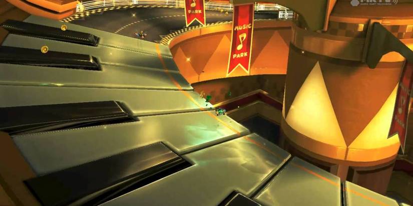 Mario Kart racers passing the piano section of Music Park