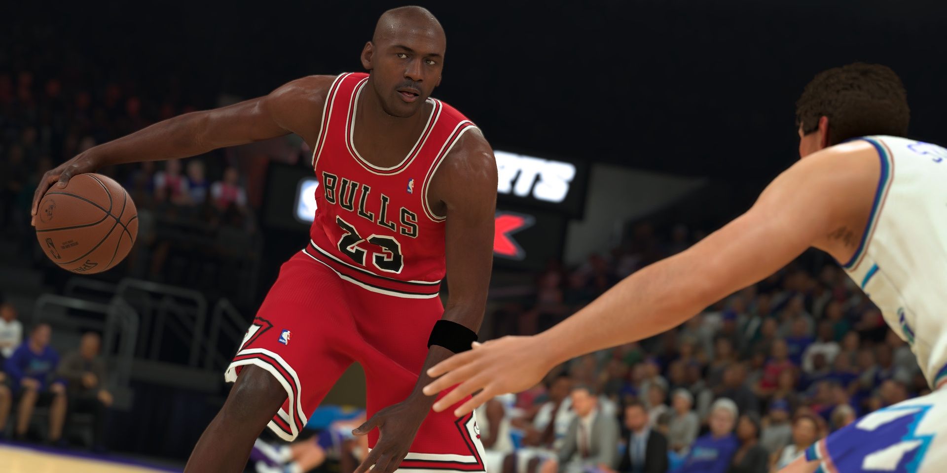 Michael Jordan going up against a player in NBA 2K23