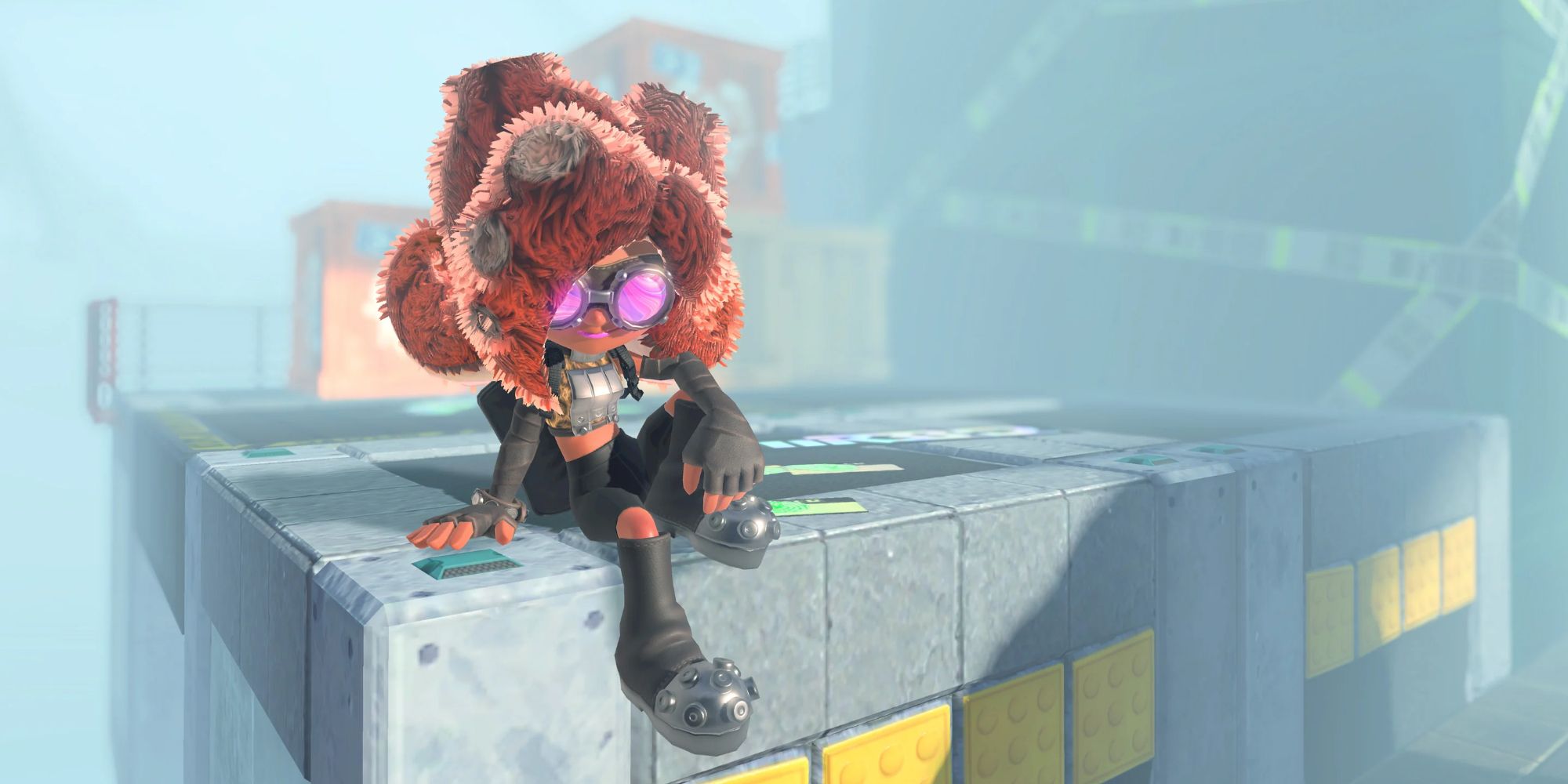 An octoling sits on top of a building