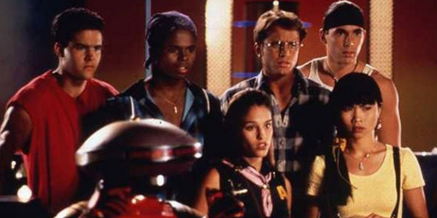 The original six Mighty Morphin Power Rangers in the Command Center with Alpha-5