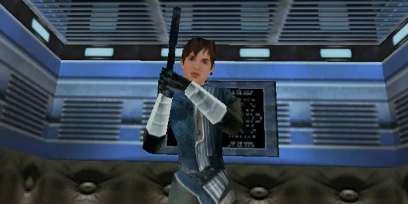 Joanna Dark holding a silenced gun in Perfect Dark