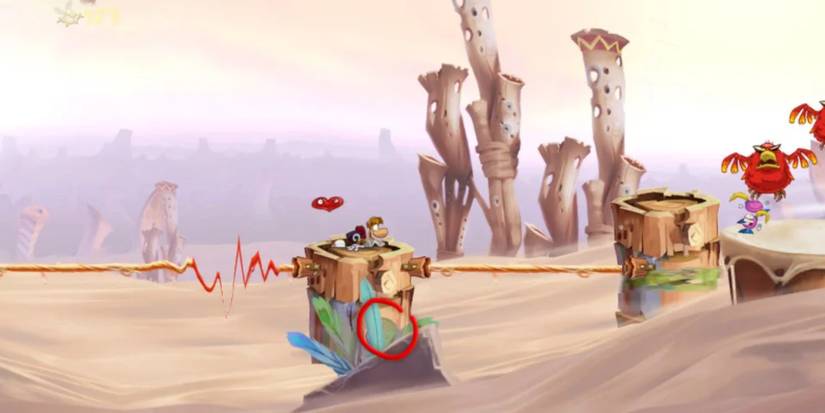 Rayman on a platform in the Desert of Dijiridoos