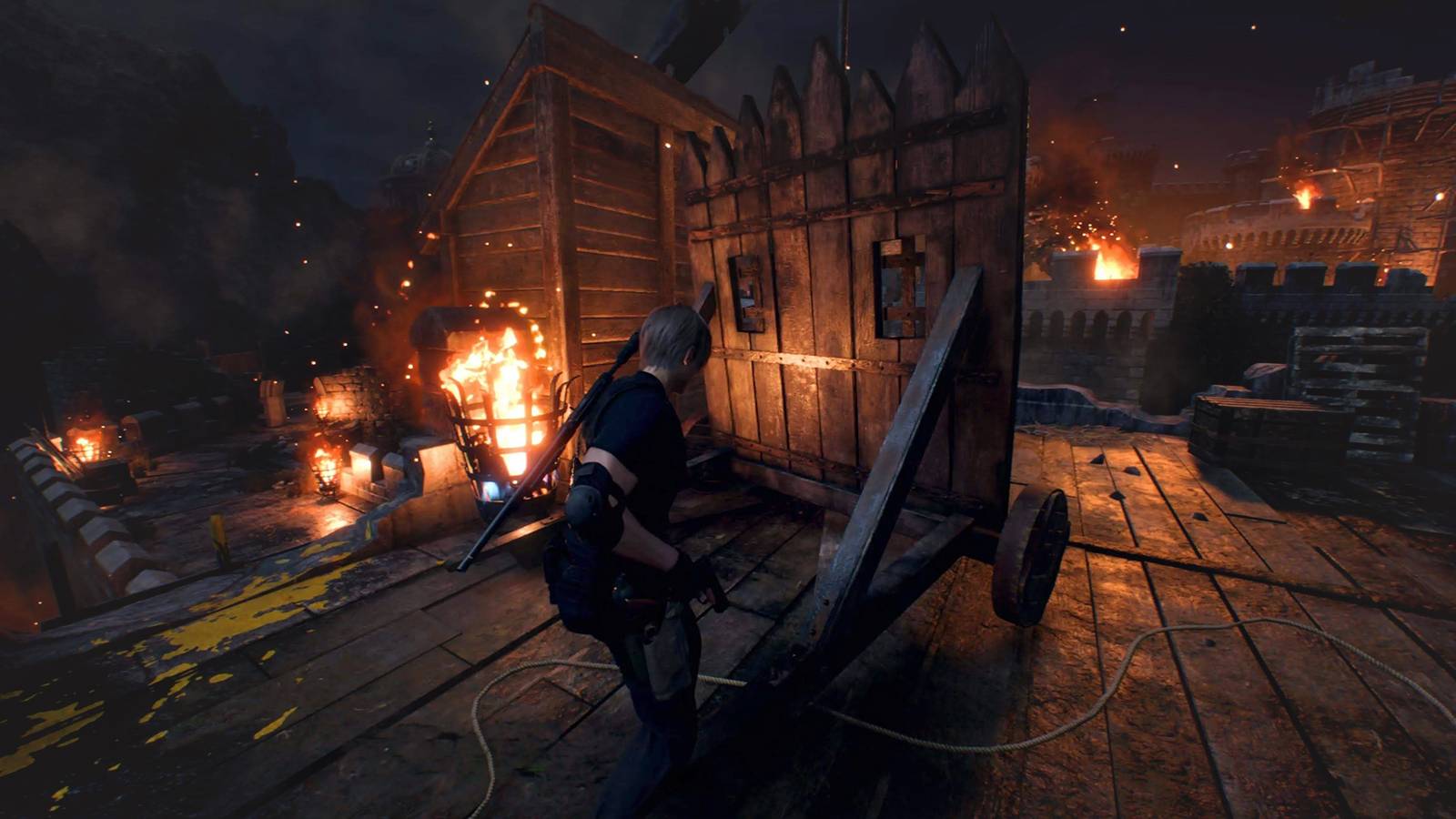 Resident Evil 4 remake Leon behind castle barricade