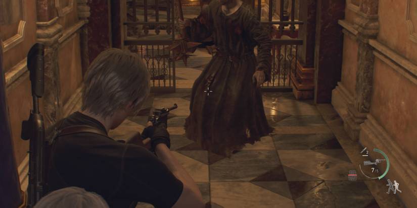 Leon aims at a Cultist's leg in Resident Evil 4 remake