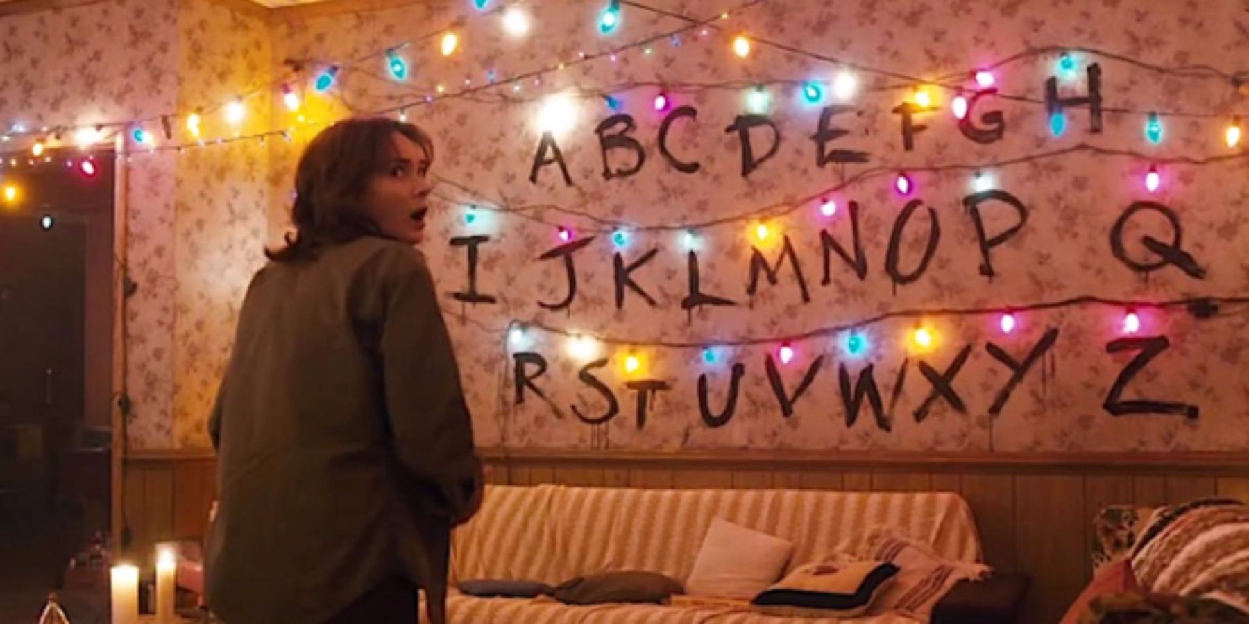 Joyce looking at Christmas lights in Stranger Things