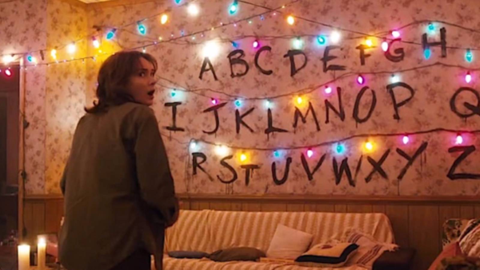 Joyce looking at Christmas lights in Stranger Things